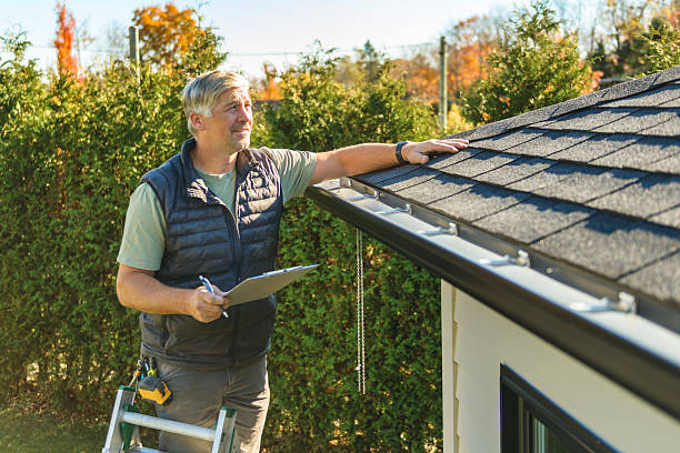 Professional Roof Replacement technician working in Centralia, KS